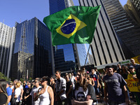 Demonstrators protest against the death of Brazilian military policemen at Paulista Avenue in Sao Paulo, Brazil, on July 23, 2017. (