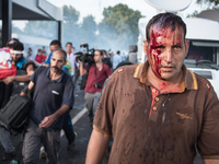 After a sudden border closure along the Balkan route, migrants and refugees rioted and threw rocks at Hungarian border police, who responded...