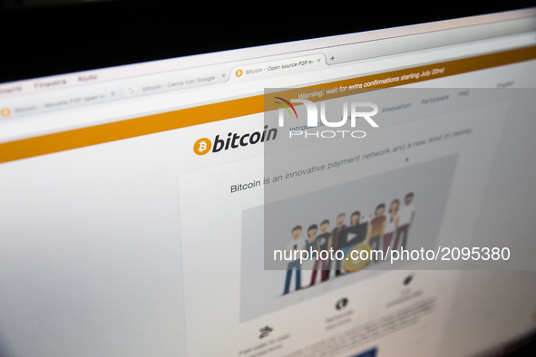 A view of a cryptocurrency Bitcoin website. Bitcoin is a cryptocurrency and a digital payment system invented by an unknown programmer, or a...