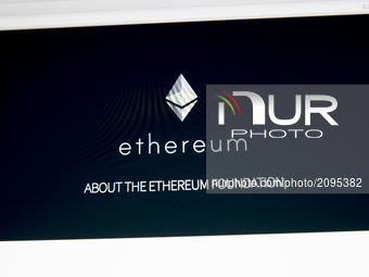 A view of a cryptocurrency Ethereum website. Ethereum is an open-source, public, blockchain-based distributed computing platform featuring s...