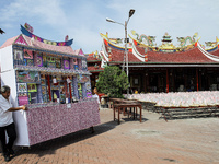 Indonesian ethnic Chinese raised houses made of paper on the Hungry Ghost Festival celebration ceremony held at the East Mountain monastery...