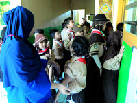 BUKIT DURI, JAKARTA, INDONESIA, AUGUST - 02 : Health officers gave Measleas Rubela (MR) immunization injection to elementary school students...