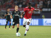 Paul Pogba of Manchester United and Luka Modric of Real Madrid during the UEFA Super Cup final between Real Madrid and Manchester United at...