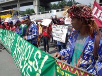 Manobo indigenous peoples attend a rally coinciding the International Day of the World's Indigenous Peoples outside Camp Aguinaldo in Quezon...