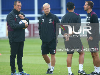 Terry Westley manager of West Ham United U23s with his staff during Friendly match between Billericay Town and West Ham United XI at AGP Are...