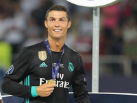 Cristiano Ronaldo of Real Madrid celebrates with his winners medal after the UEFA Super Cup final between Real Madrid and Manchester United...