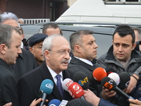 Turkey's main opposition Republican People's Party (CHP) leader Kemal Kilicdaroglu (L2) can be seen during a press statement in Ankara, Turk...