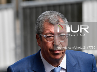 Mayor of Levallois-Perret Patrick Balkany answers journalists' questions on the site where a vehicle hit soldiers and disappeared in the Par...