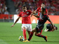 Benfica's Portuguese defender Andre Almeida (L ) vies with Braga's defender Jefferson during the Portuguese League football match SL Benfica...