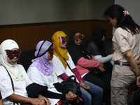 International human trafficking victims, who were rescued were also presented at a press conference at the Indonesian National Police Crimin...