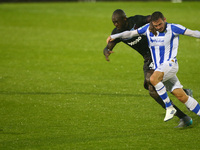 Drey Wright of Colchester United tussle with Aston Villa's Christopher Samba
during Carabao Cup First Round match between Colchester United...