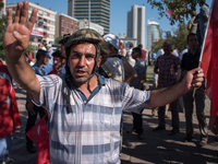 Pro-government demostrator wear a military helmet to a rally following the failed coup attempt. Photo taken 16 July 2016 (