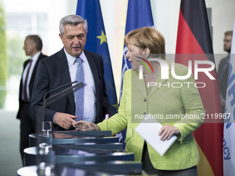 German Chancellor Angela Merkel (L) and High Commissioner of United Nations High Commissioner for Refugees (UNHCR) Filippo Grandi (R) arrive...