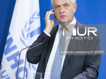 United Nations High Commissioner for Refugees Filippo Grandi is pictured during a news conference held with German Chancellor Angela Merkel...
