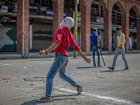  A Kashmiri Muslim protester throws stones at  Indian government forces  during an anti India protest on August 11, 2017 in Srinagar, the su...