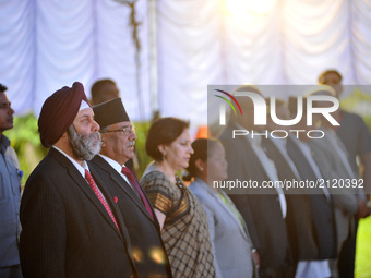 Manjeev Singh Puri, Ambassador of India to Nepal, former prime minister Puspa Kamal Dahal and other ministers and stands as the National ant...