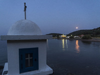 On 7th of August 2017 the summer full moon had also an eclipse. Pictures are during the moonrise in Xina, Aghios Nikolaos (Saint Nicolas) in...