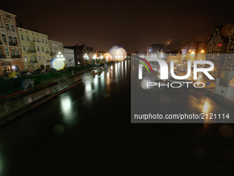 The river Brda is seen in the center of the city  in Bydgoszcz, Poland on the night of 11 August, 2017. (