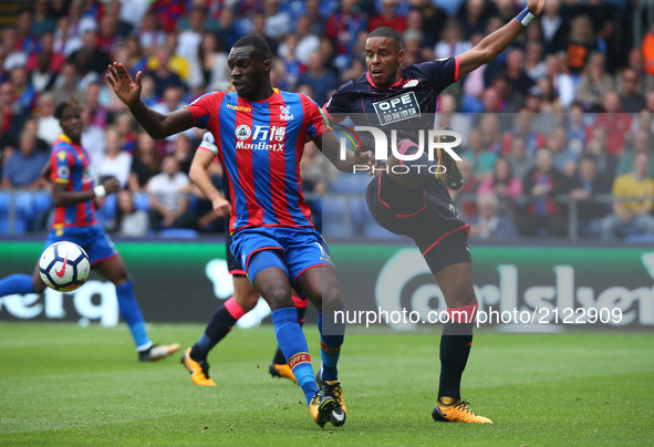 L-R Crystal Palace's Christian Benteke andHuddersfield Town's Mathias Jrgensen
during Premier League  match between Crystal Palace and Hudde...