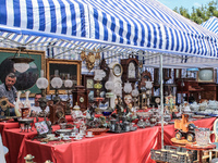 People looking for goods at a flea market during 757th edition of St. Dominic’s Fair are seen in Gdansk, Poland on 13 August 2017  More than...