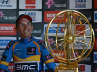 Dylan Teuns of Belgium from BMC Racing Team with the Arctic Race Trophy after winning the fourth final stage and the Arctic Race of Norway 2...