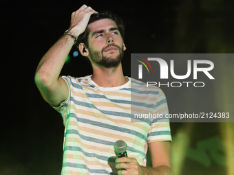 Spanish Latin pop musician Alvaro Soler on stage as he performs at Porto Turistico in Pescara, Italy August 13, 2017 (