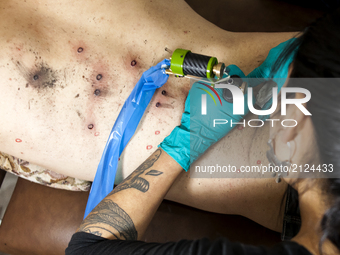 The visual artist and Mapuche poet Francisco Vargas Huaquimilla tattooed wounds of pellets as part of an 