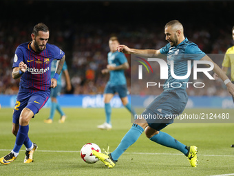 Karim Benzema and Aleix Vidal during the spanish Super Cup match between F.C. Barcelona v Real Madrid, in Barcelona, on August 13, 2017. (