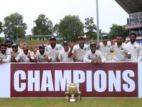 Indian team pose for a group photograph after defeating Sri Lanka in the 3rd Test match to white wash the Test series 3-0 after the 3rd Day'...