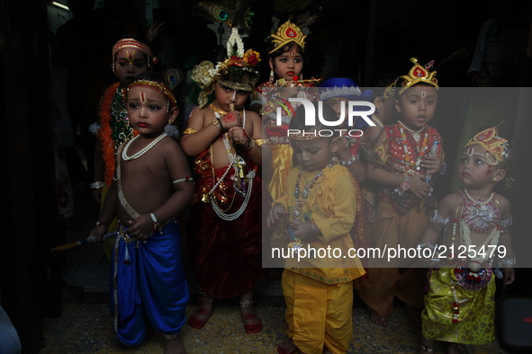 Indian Children dress court Indian goad Sri Krisna and celebrate the Maha Jarmastami on August 14,2017 in Kolkata,India. 