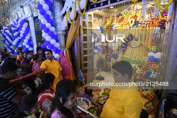 Hindu devotees celebrate the Maha Jarmastami at a city temple on August 14,2017 in Kolkata,India. 