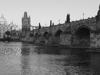 The Charles Bridge is the oldest bridge in Prague, and crosses the Vltava River from the Old Town to the Small Town was built in 1357 with t...