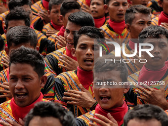 Around 12,262 dancers took part in a record-breaking traditional Saman dance performance in Gayo Lues District on August 13, 2017, in Aceh P...