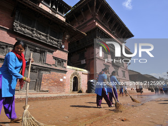 Nepalese people cleaning passages for the President of Nepal, Bidhya Devi Bhandari arrival during Krishna Janmashtami Festival celebrated at...