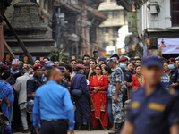 Nepalese police officers guards around temple as President of Nepal, Bidhya Devi Bhandari arrives during Krishna Janmashtami Festival celebr...