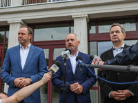 PO (Civic Platform) Parliament members: Slawomir Neumann (C), Stanislaw Lamczyk (R) and Marshal of the Pomorskie Voivodeship Mieczyslaw Stru...