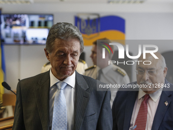 Yuri Sergeyev (L), the former permanent representative of Ukraine to the UN is seen at a Obolon district court of Kyiv before being interrog...