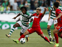 Sporting's forward Gelson Martins (L) vies for the ball with Steaua's forward Catalin Golofca (R)  during Champions League 2017/18, first pl...