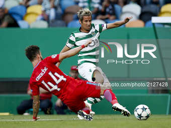 Sporting's defender Fabio Coentrao (R) vies for the ball with Steaua's midfielder Gabriel Enache (L)  during Champions League 2017/18, first...