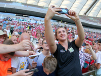Malwina Kopron (POL) takes a selfie with her fans during the 5th Kamila Skolimowska Memorial of athletics in Warsaw, Poland, on 15 August, 2...