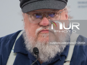American novelist and short-story writer, screenwriter, and television producer George R. R. Martin attends a press conference  on August 16...
