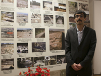 Farzad Madadzadeh, Iranian expolitical prisoner, poses at exhibition on the massacre of 30,000 political prisoners in Iran in the summer of...