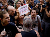 Anti-fascist activists  argue with a  far-right sympathiser during the vigil that took place in las Ramblas of Barcelona on 18 August, 2017,...
