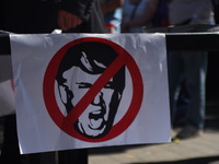 Demonstrators gathered outside the American Embassy in Central London, to protest against the racism escalation following the riot in Charlo...