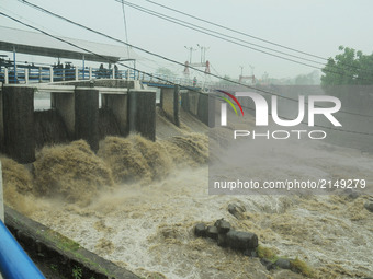 Rapid flow of river water at the gates of katulampa, Bogor, West Java, August 29,2017. Katulampa water gate is a building located in Katulam...