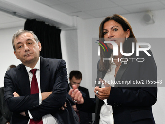 The Mayor of Paris, Anne Hidalgo and the Rector of the Academie of Paris, Mr Gilles Pecout (L) visite the Pierre Mendes France Highschool an...