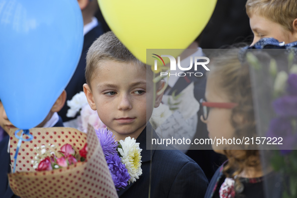 Schoolchildren attend a ceremony to mark the start of the school year in Kyiv, Ukraine September 1, 2017. 