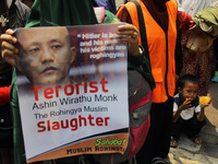 Indonesian Muslim activists who are members of the Muslim Friends of Rohingya took action at the Embassy of Myanmar, Jakarta, Indonesia, Mon...