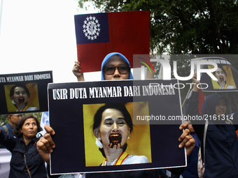 Indonesian peoples held a rally as a form of solidarity for the Rohingyas in front of the Myanmar Embassy for Indonesia in Jakarta, Septembe...