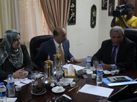 Ministers of the Palestinian unity government in Gaza strip attend a meeting in Gaza city, on August 19, 2014. (